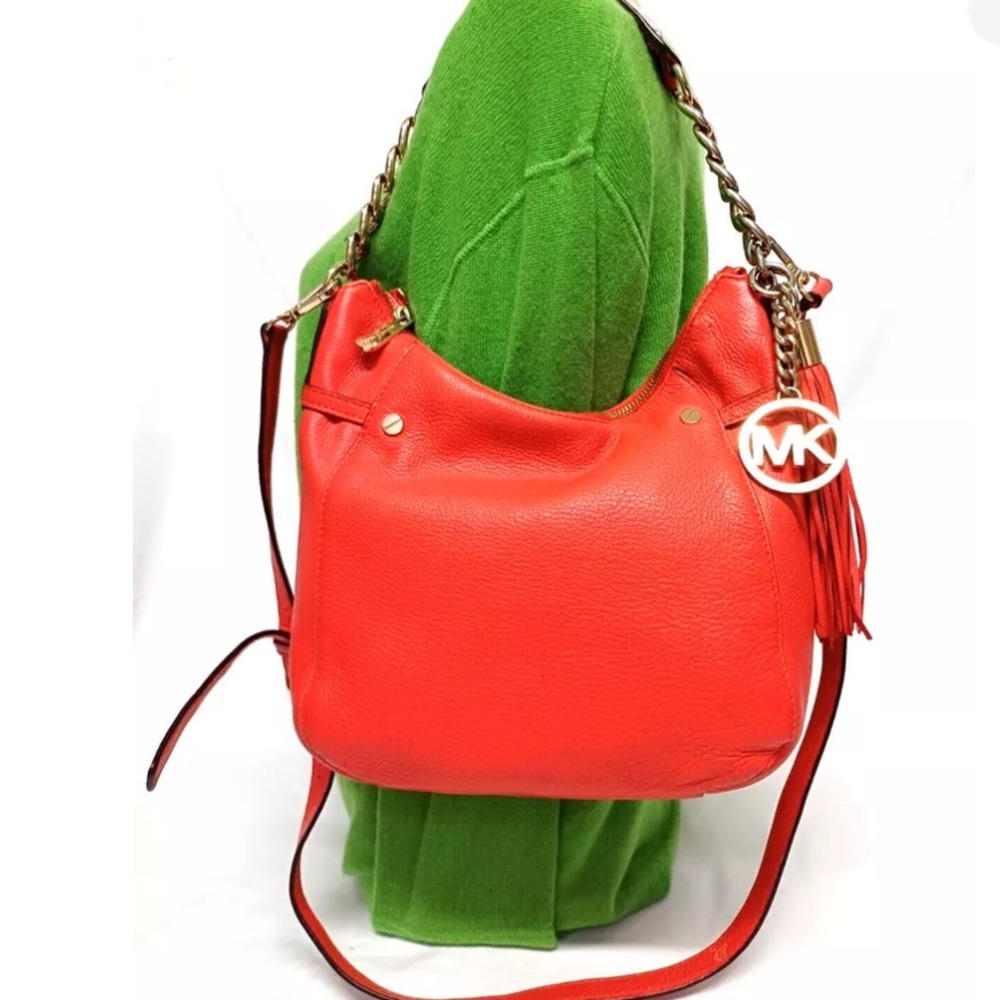 MICHAEL KORS MEGAN ORANGE PEBBLED LEATHER TASSEL CROSSBODY BAG
VG pre-owned